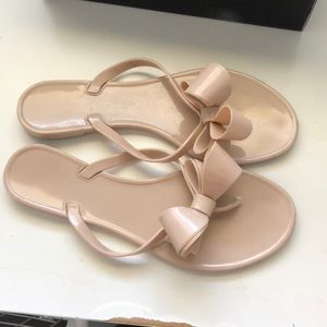 Dizzy nude bow flip flops